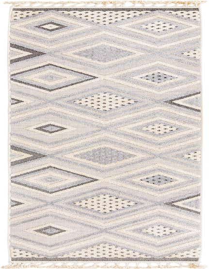 A 12 ft Arlo runner rug in ivory and cream with a modern transitional diamond and abstract pattern, featuring a high/low textured pile and decorative tassels.