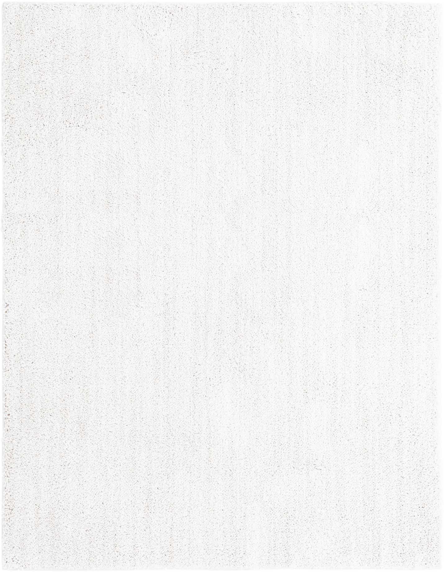 A soft, plush 6x9 rectangular shag rug in a solid ivory color, perfect for a modern living room.