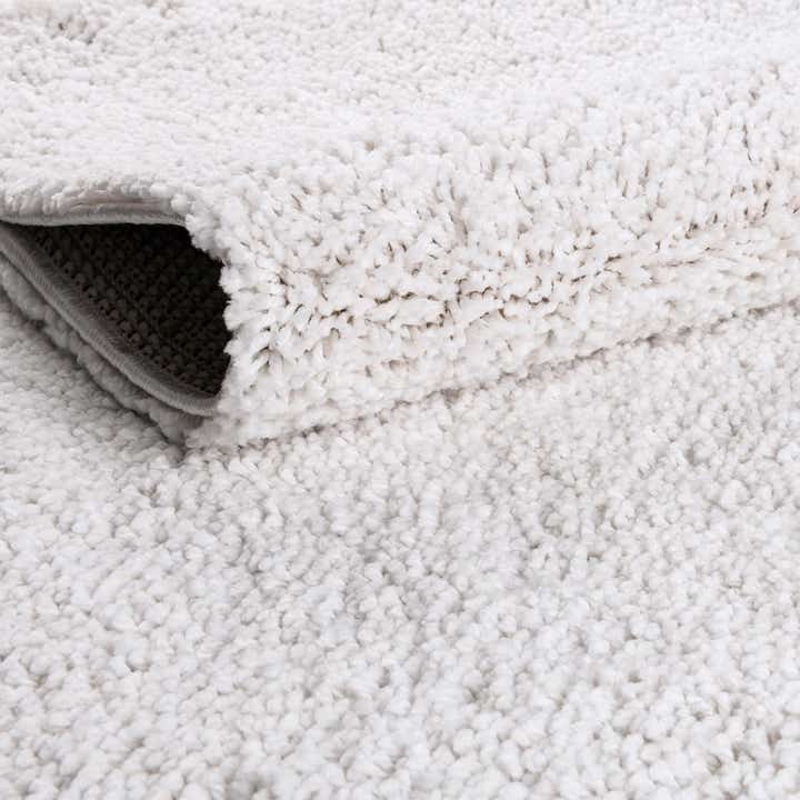 Sea Salt White 5' 3 x 8' Jill Zarin Shaggy Chic Rug | Rugs.com