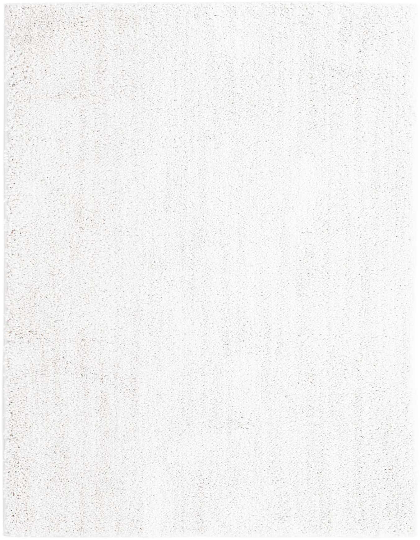 A soft, rectangular 4x6 ivory shag rug with a textured pile, perfect for a modern living room or bedroom.