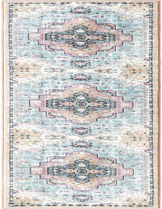 A long 8 ft runner rug featuring a distressed traditional pattern in seaglass blue, rose, and cream, with black and gold accents.