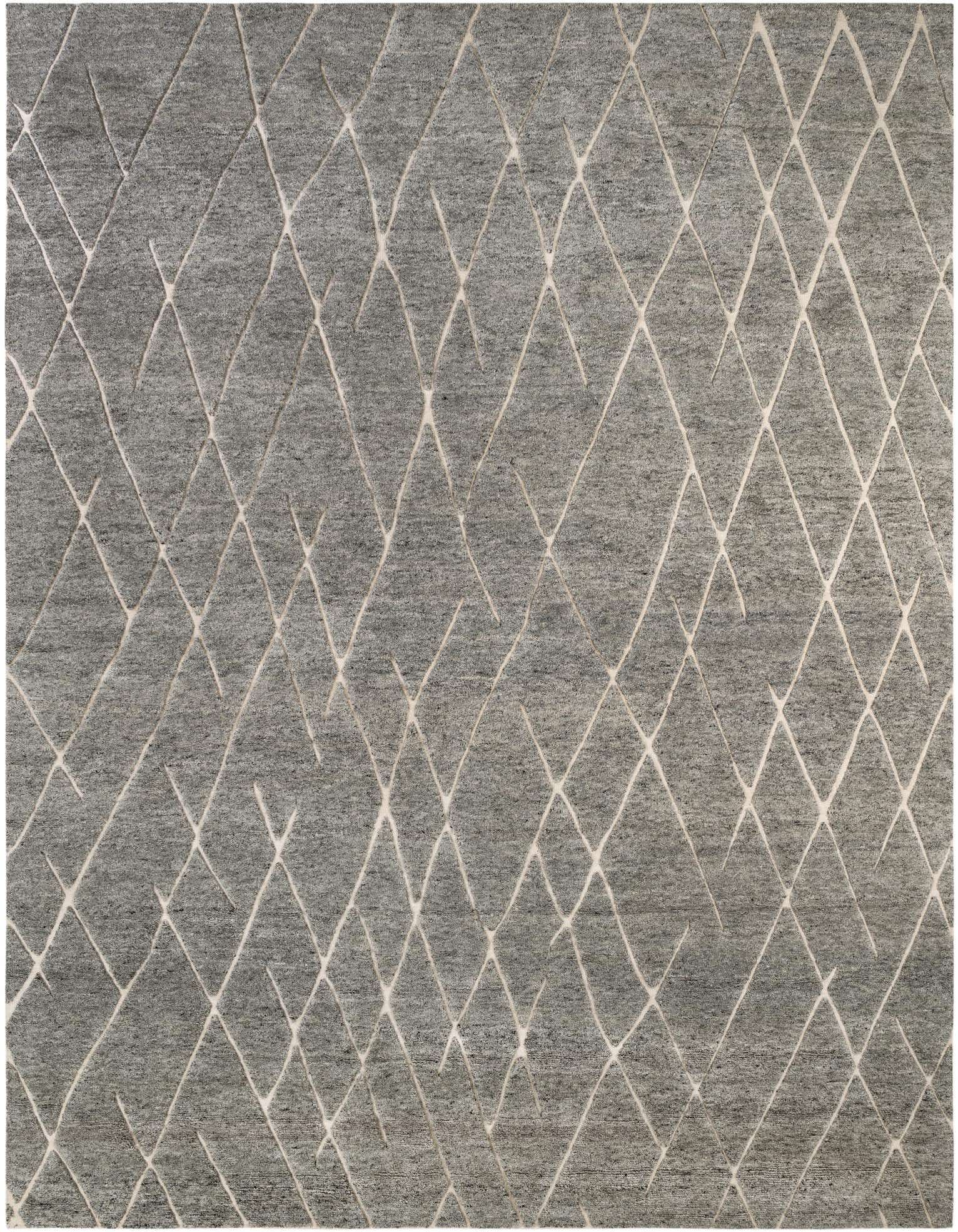 A 12x16 rectangular gray New Zealand Wool rug featuring a textured tribal diamond pattern, ideal for a living room.