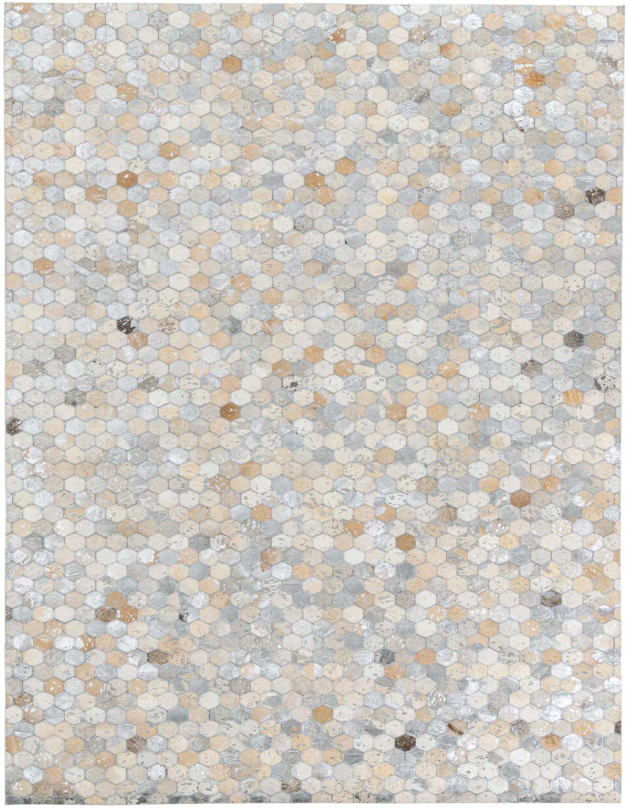 A rectangular 5x8 modern rug featuring a mosaic of small hexagonal cowhide and leather patches in various shades of gray, silver, and beige.
