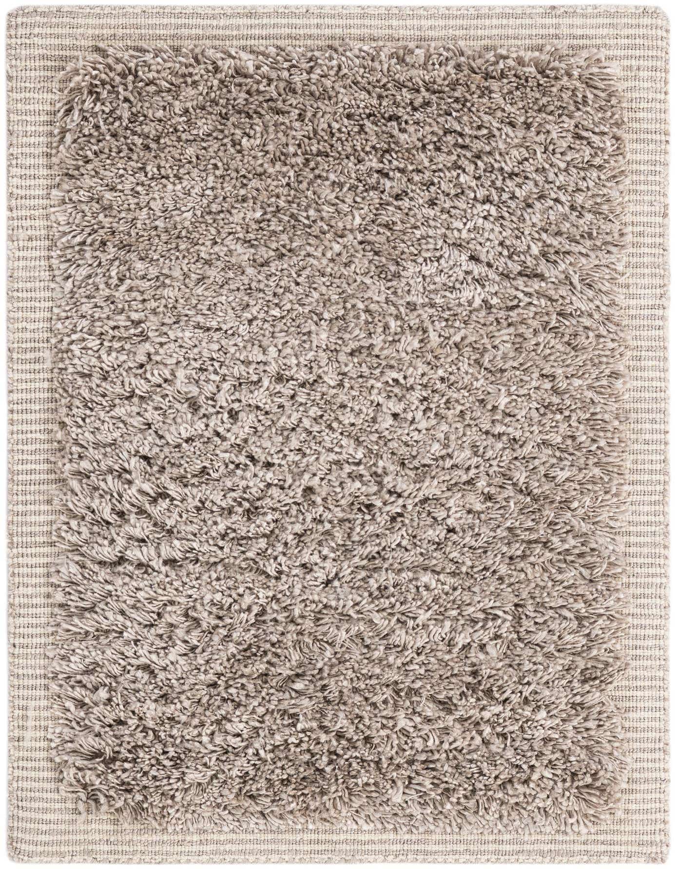 A 2x3 rectangular gray shag rug with a thick, plush pile and a subtle woven border, perfect for adding texture.