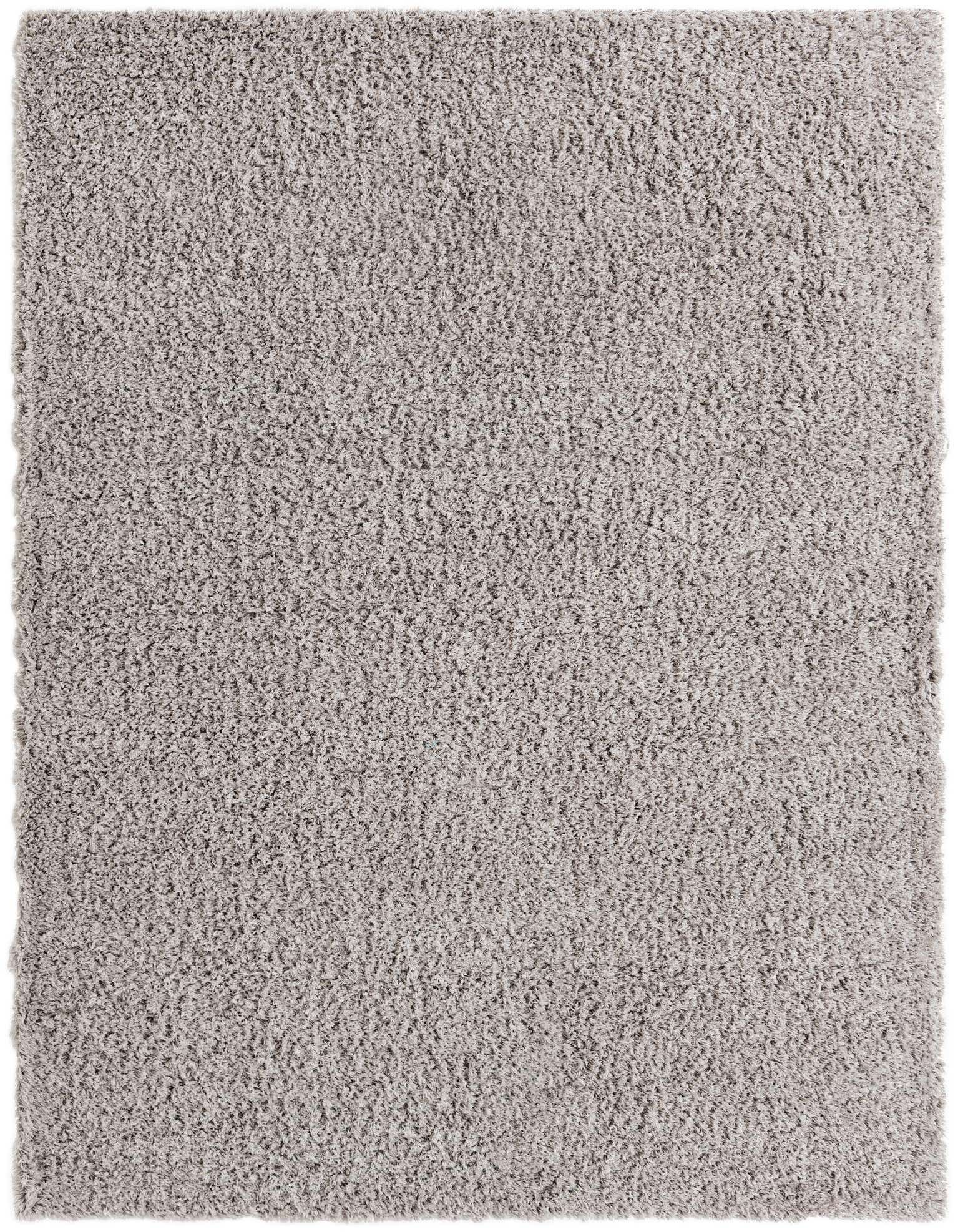 A soft, rectangular 9x12 gray shag area rug with a plush, textured pile, perfect for a modern living room or bedroom.