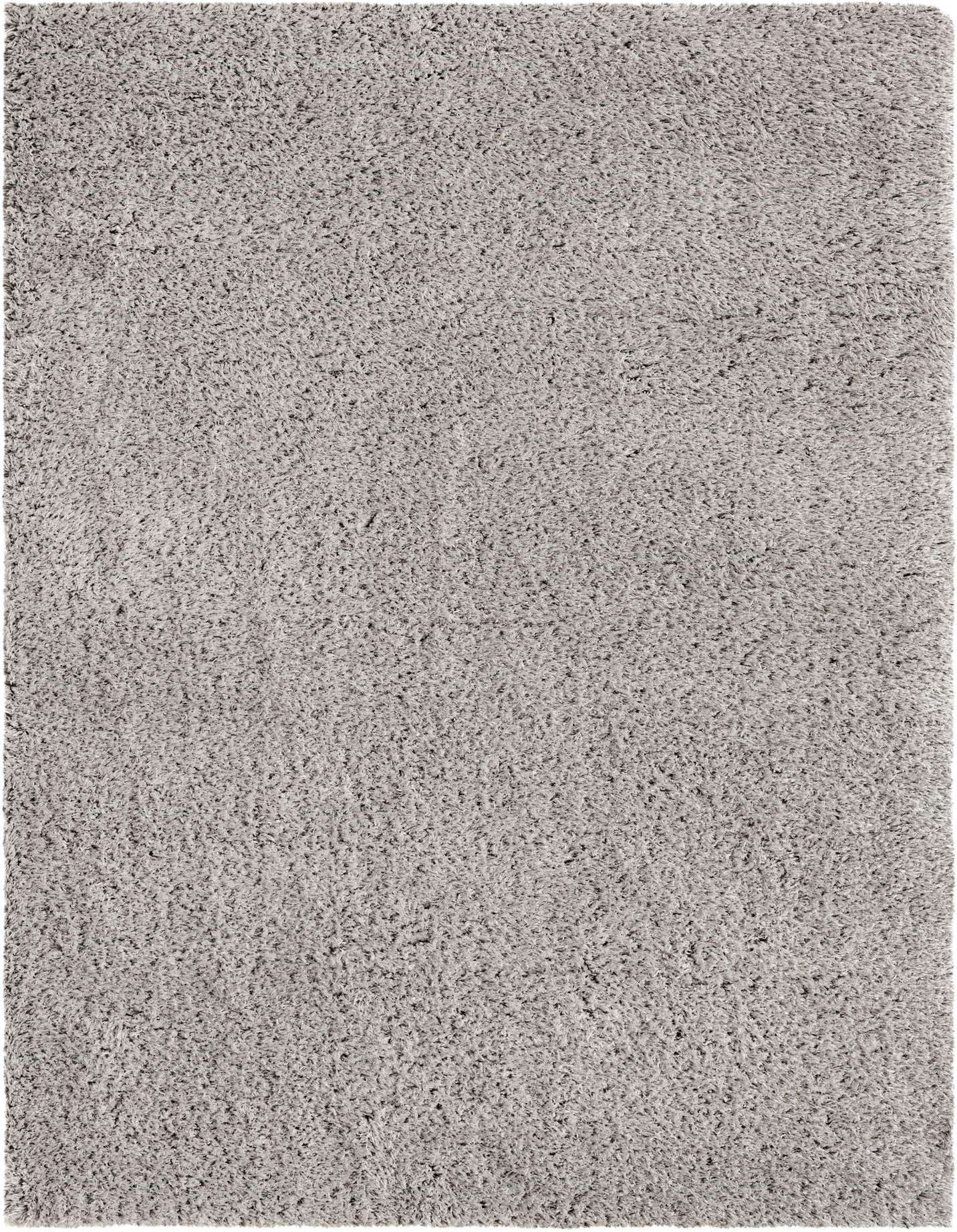 A soft, plush 7x10 rectangular gray shag rug with a textured pile, perfect for a modern living room or bedroom.