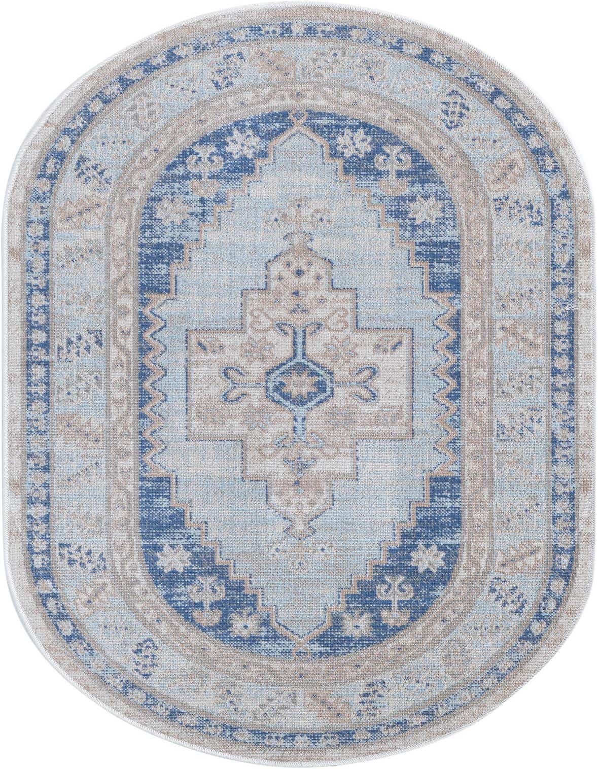 A 3' 0 x 5' 3 oval sky blue rug with a tribal medallion pattern and tan accents, suitable for indoor use.
