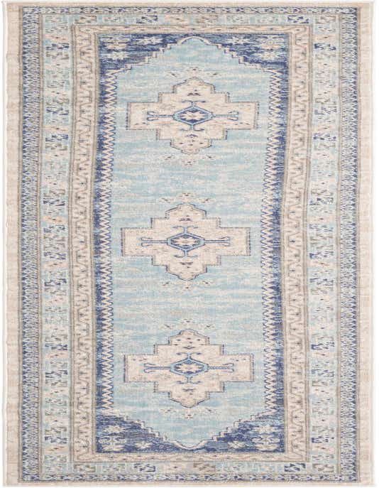 A 10 ft runner rug in sky blue with vintage tribal medallion patterns and a decorative border, ideal for a hallway.