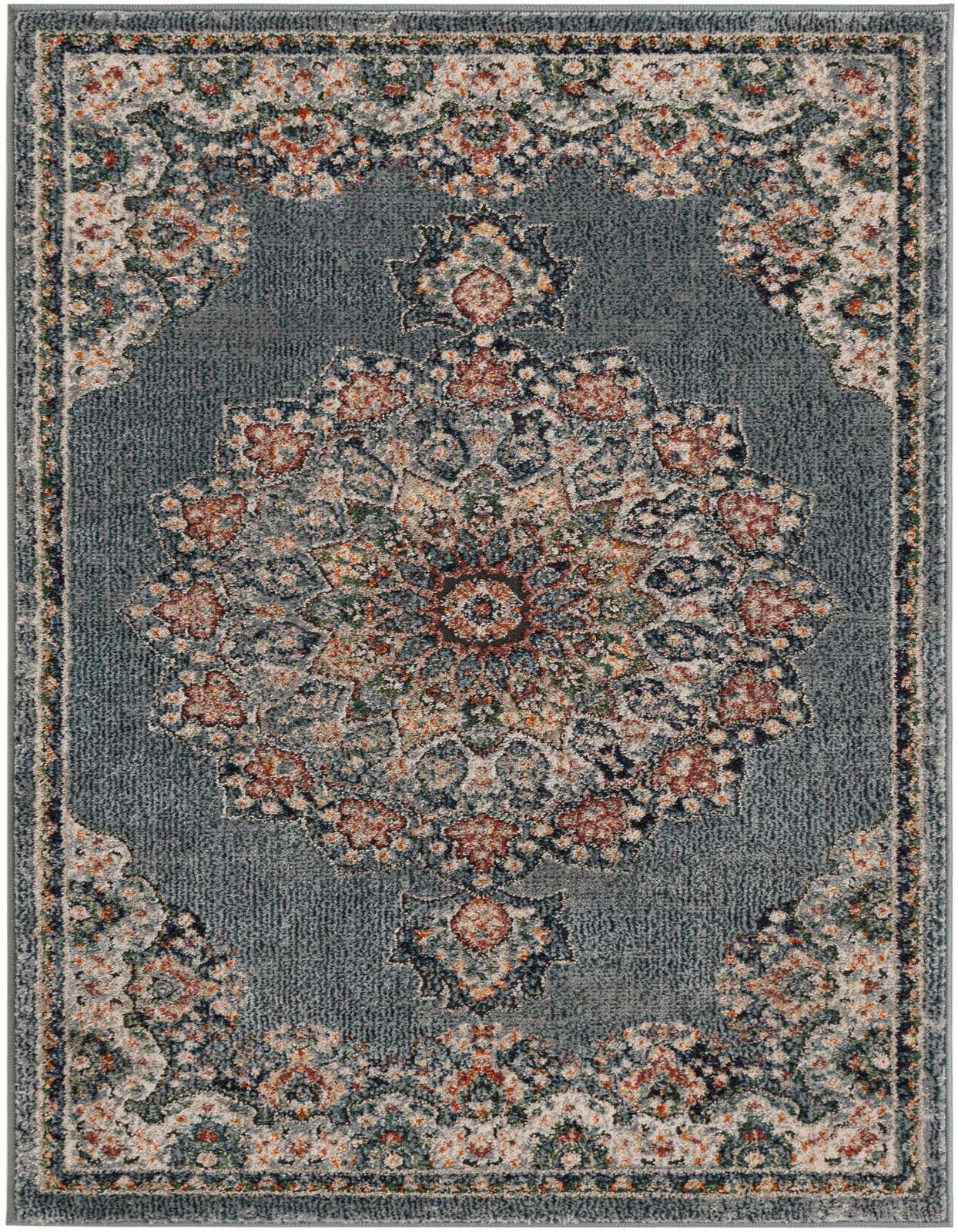 A 3x5 rectangular Isabella rug with a distressed traditional pattern in shades of blue, orange, and cream.