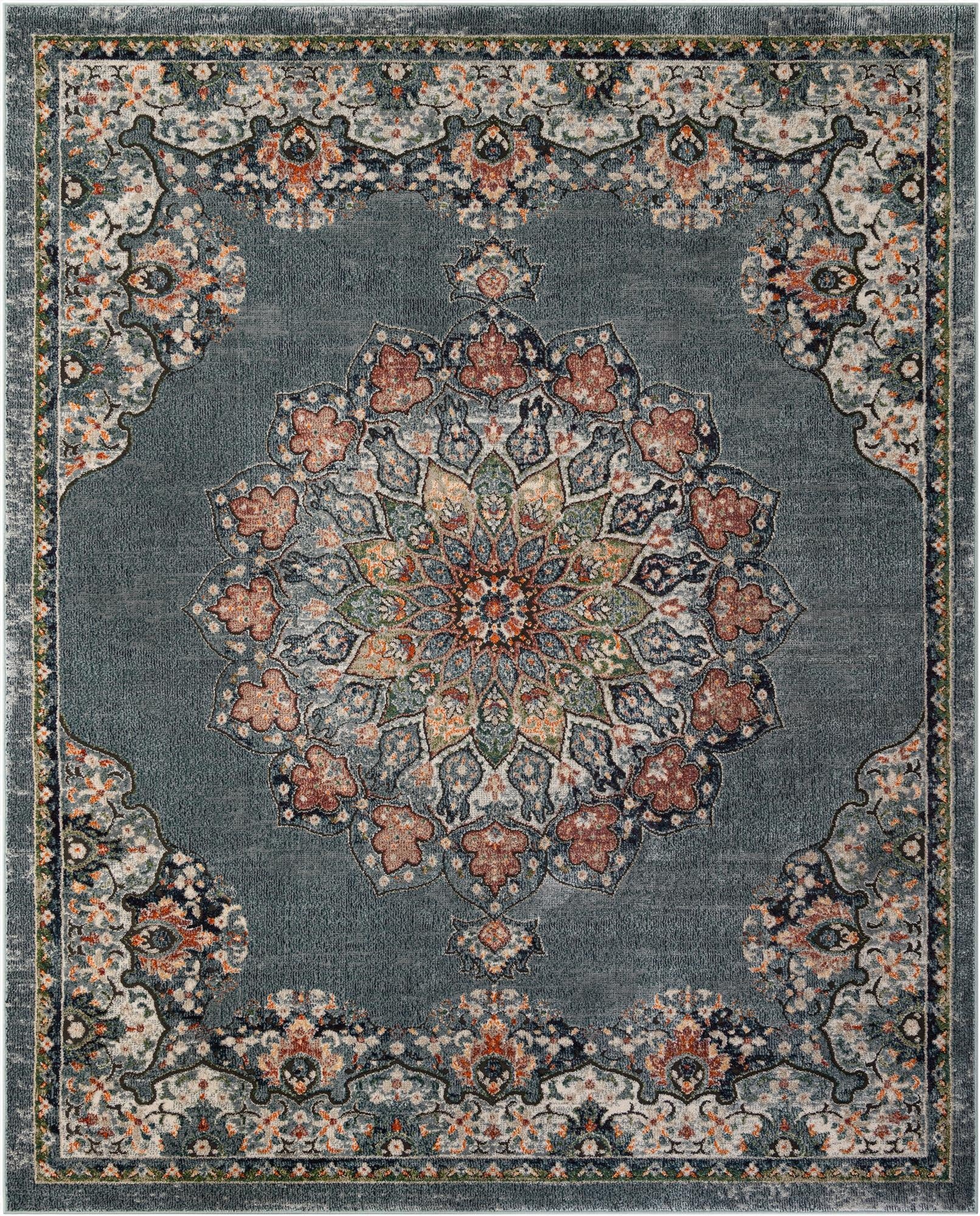 An 8x10 rectangular Isabella rug in shades of blue with a central medallion and traditional Oriental patterns in rust, cream, and green.