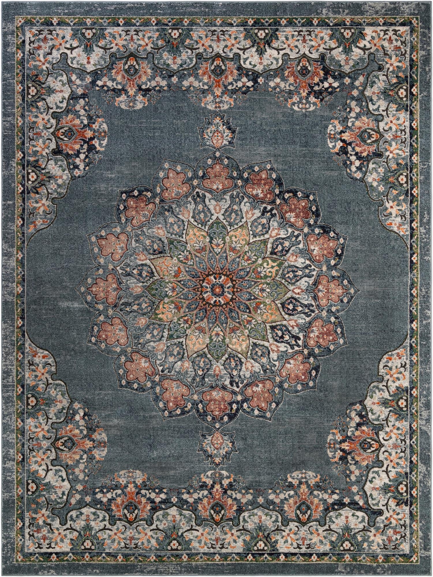 A 9x12 rectangular Isabella collection rug in shades of blue with an intricate floral medallion pattern.