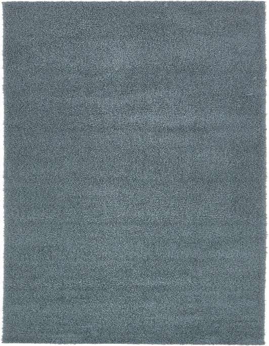 A 10 ft runner rug from the Rugs.com Solid Shag collection, featuring a soft, high pile in a solid blue color, perfect for a hallway.