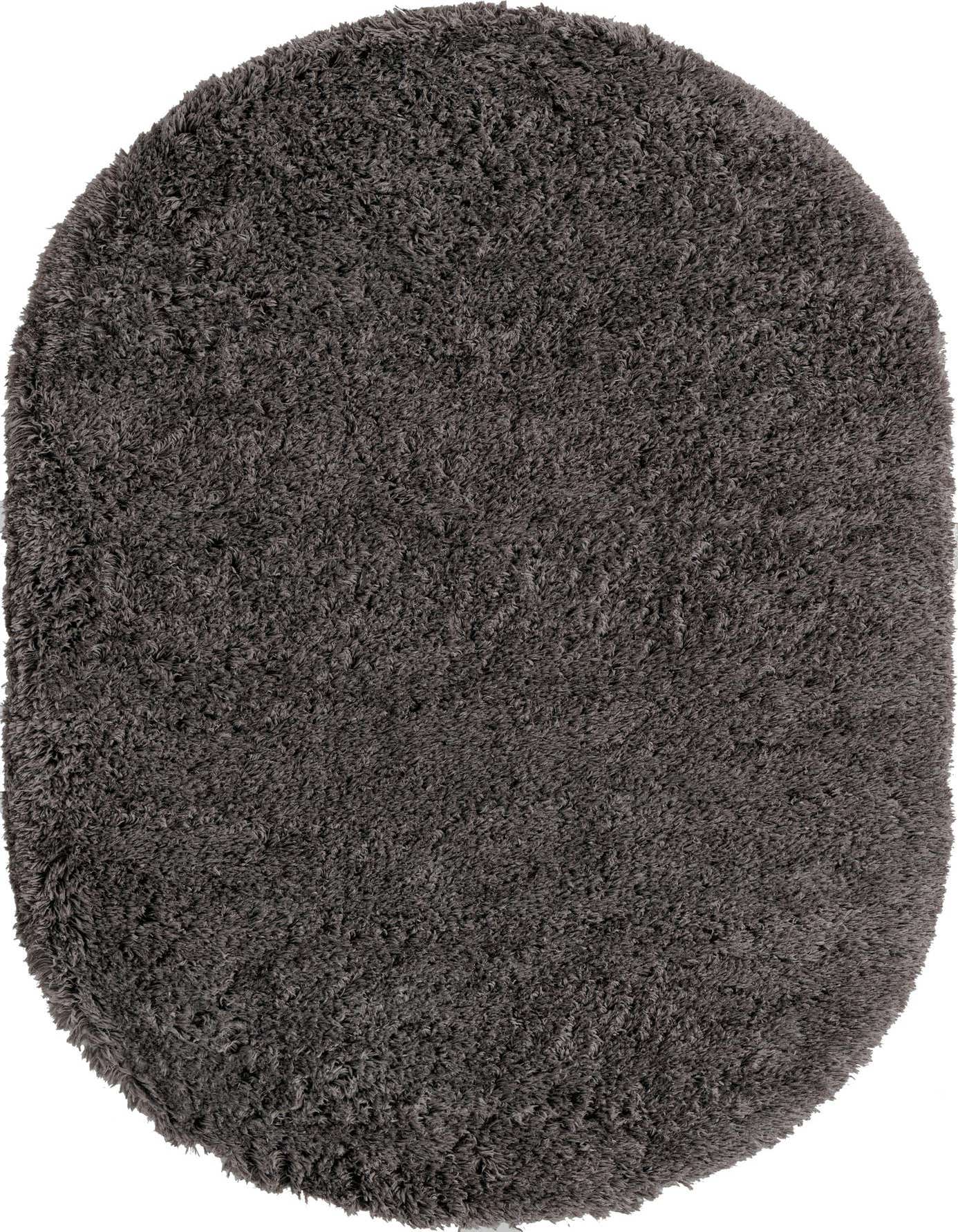 A plush, oval 5' 3 x 8' 0 gray shag rug with a soft, textured pile, perfect for adding comfort to any indoor space.