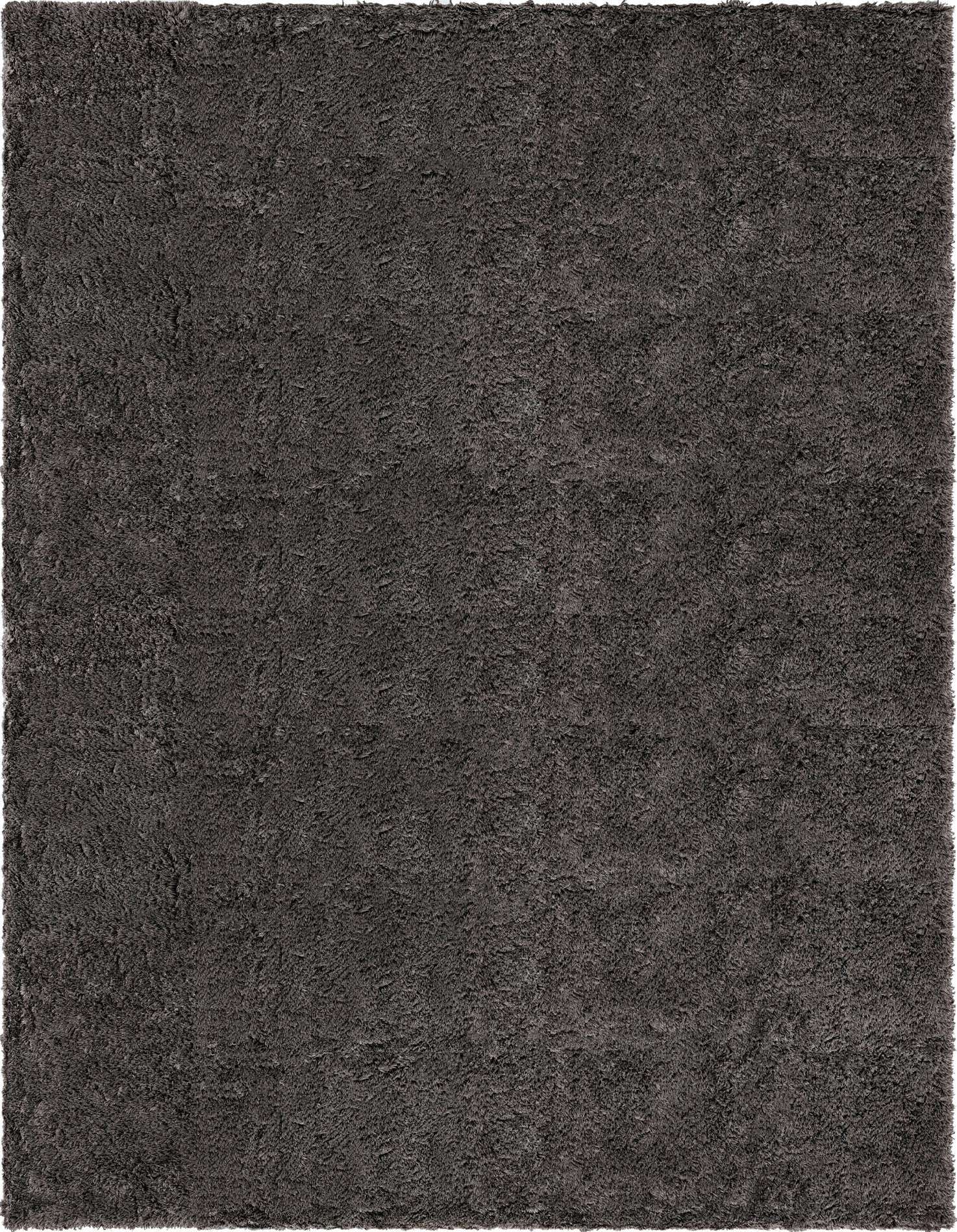 A 7x10 rectangular gray shag rug with a plush, textured pile, suitable for a modern living room or bedroom.