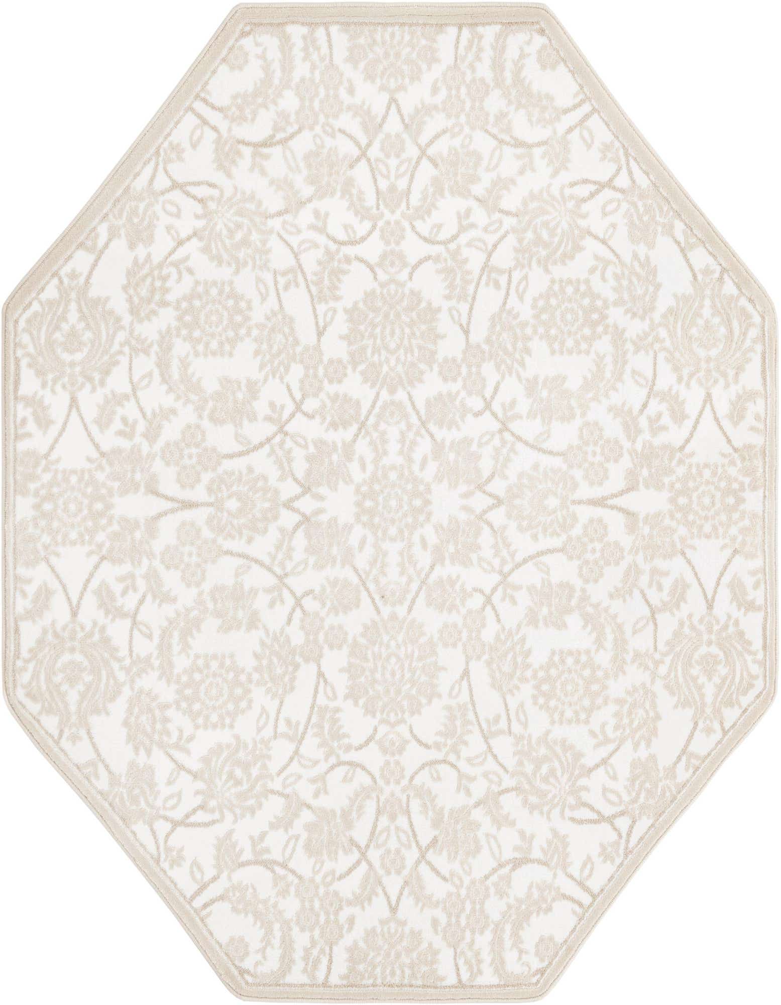 An off-white octagon rug with a subtle beige traditional floral pattern and a thin border.