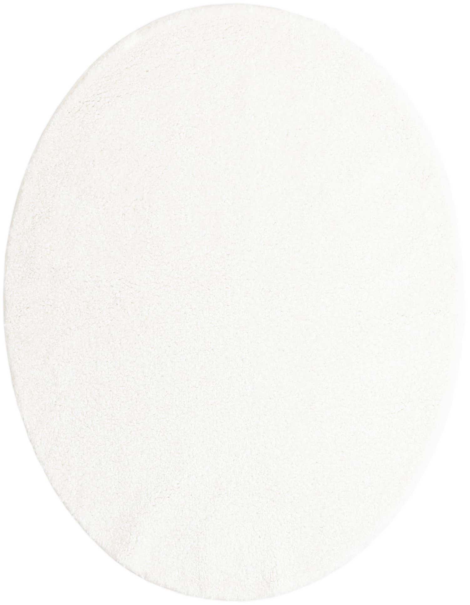 A soft, plush 5' 3 round white shag rug, perfect for adding comfort to a modern or minimalist indoor space.