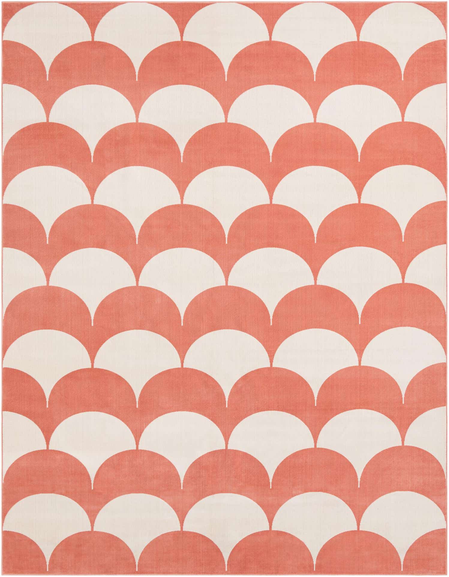 A 10x13 rectangular area rug featuring a modern abstract pattern of soft coral pink and off-white scallop shapes.