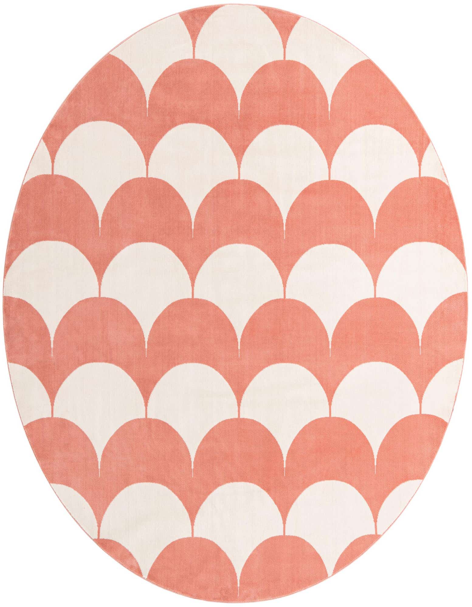 A round rug with a modern abstract pattern of alternating soft coral pink and off-white scallop shapes.