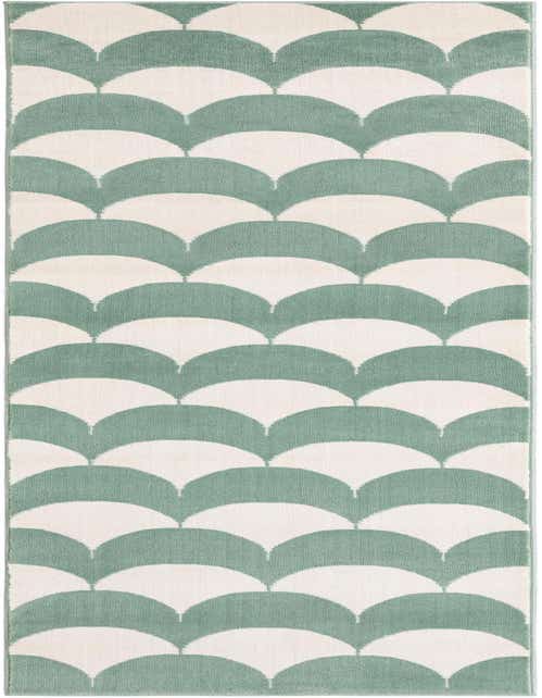 A soft green and cream runner rug with a modern abstract scallop pattern, perfect for a hallway or kitchen.