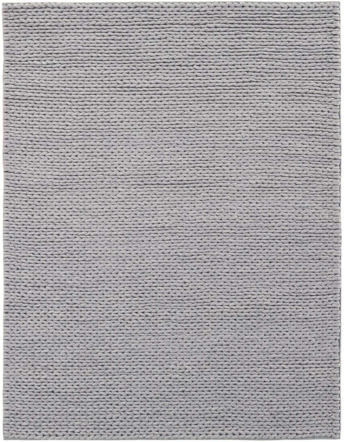 A 4x6 rectangular gray New Zealand wool rug with a textured, hand-knitted solid pattern, suitable for a living room or office.