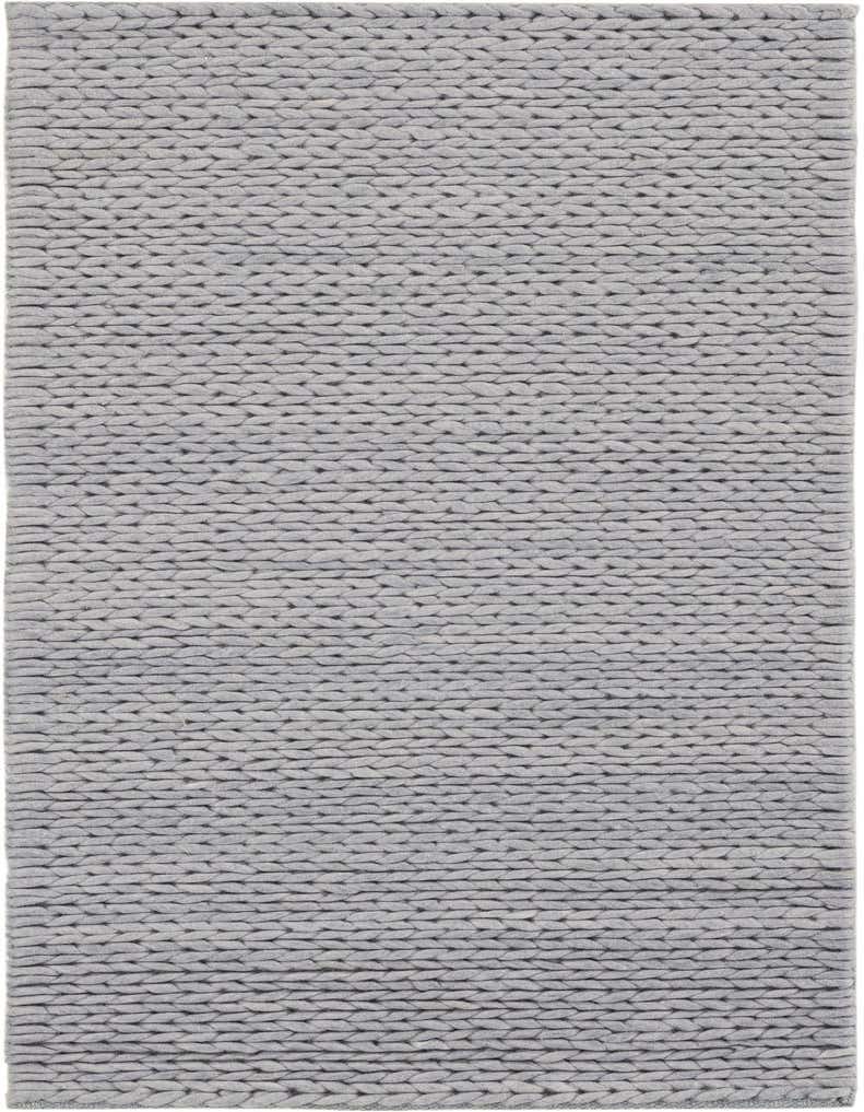 A 5 ft runner rug in light gray New Zealand wool, featuring a chunky, braided textured weave, ideal for a hallway.
