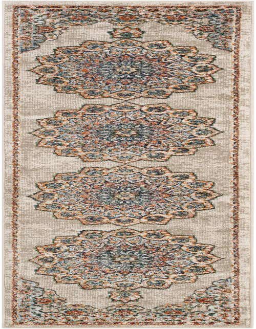 An 8 ft runner rug with a distressed medallion pattern in shades of brown, tan, ivory, blue, and orange.