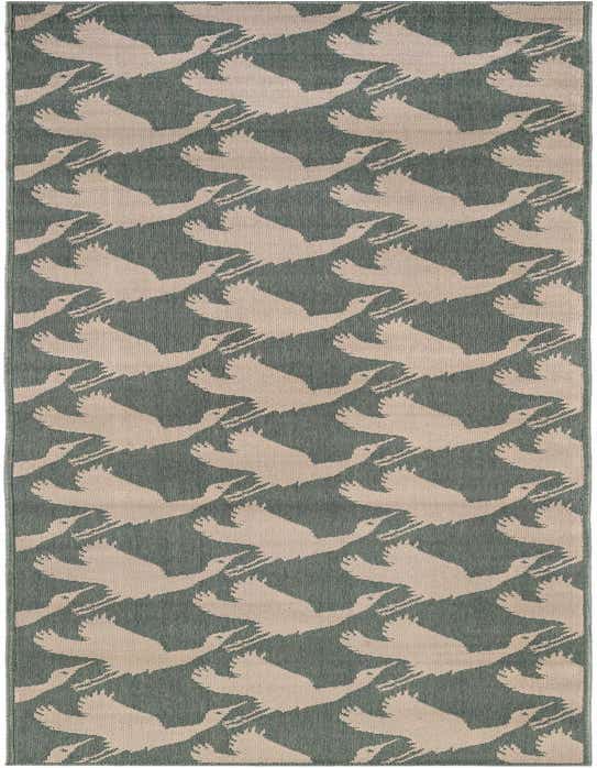 A 10 ft runner rug with a repeating modern pattern of light beige flying geese on a blue-gray background, ideal for a hallway or patio.