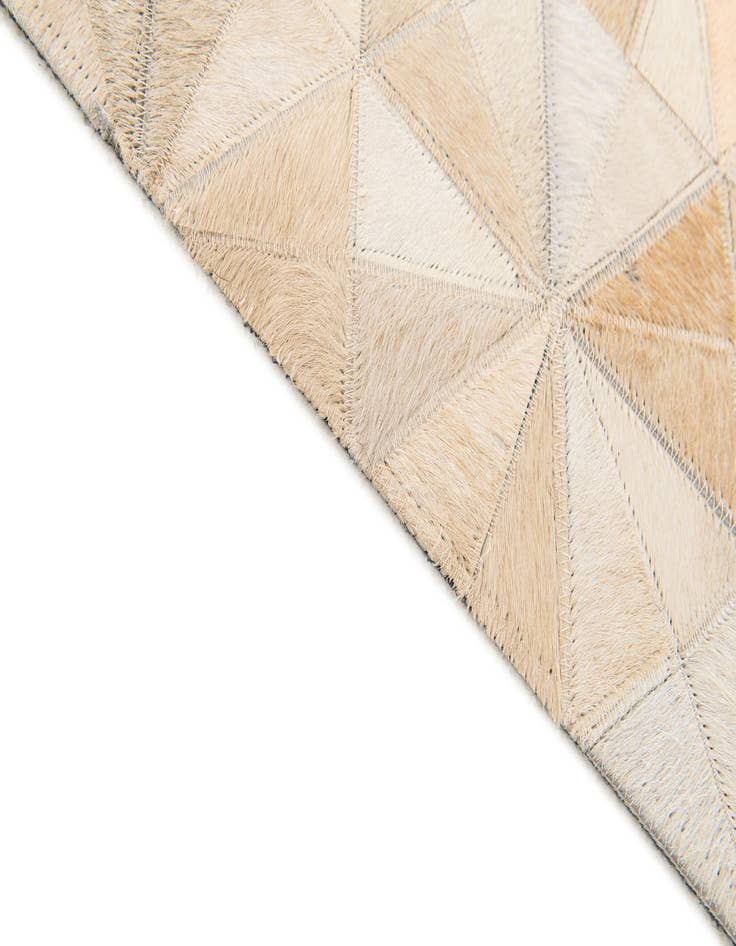 Detail image of  3' 11 x 6' Cowhide Stocks Rug