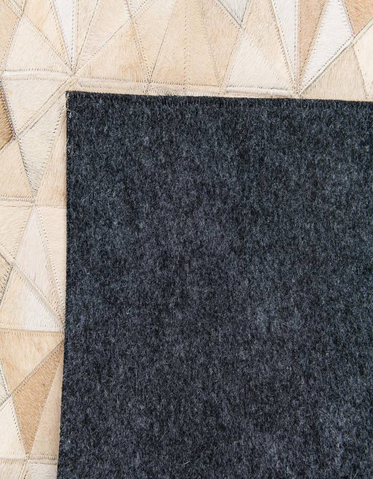 Detail image of  3' 11 x 6' Cowhide Stocks Rug