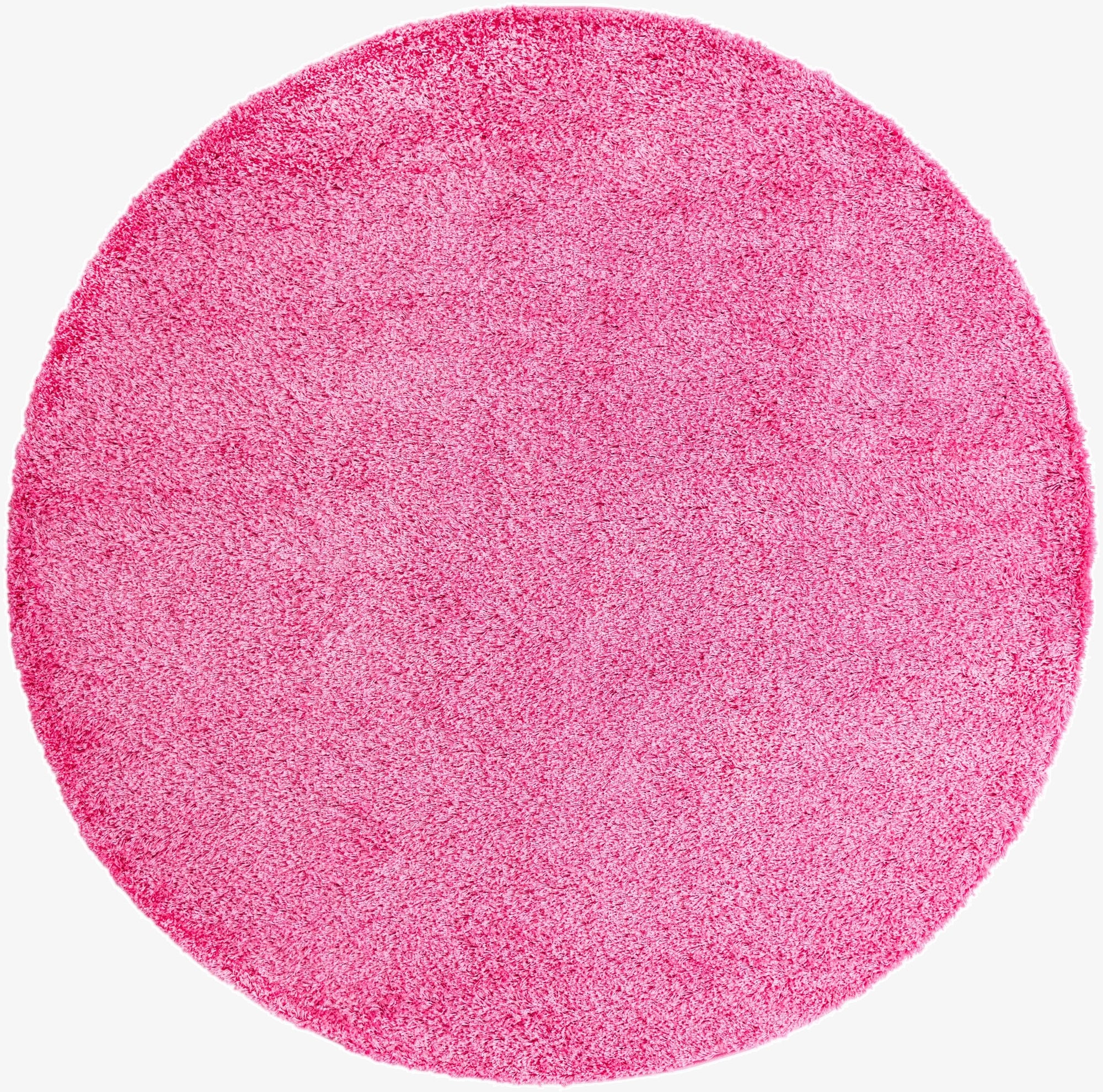 A vibrant 7' 10 x 7' 10 round pink shag rug with a plush, textured pile, ideal for adding a pop of color to any indoor space.