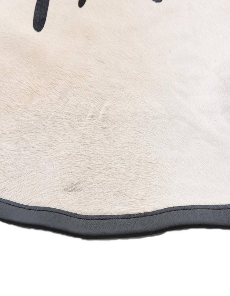 Detail image of  5' 8 x 6' 9 Cowhide Freeform Rug