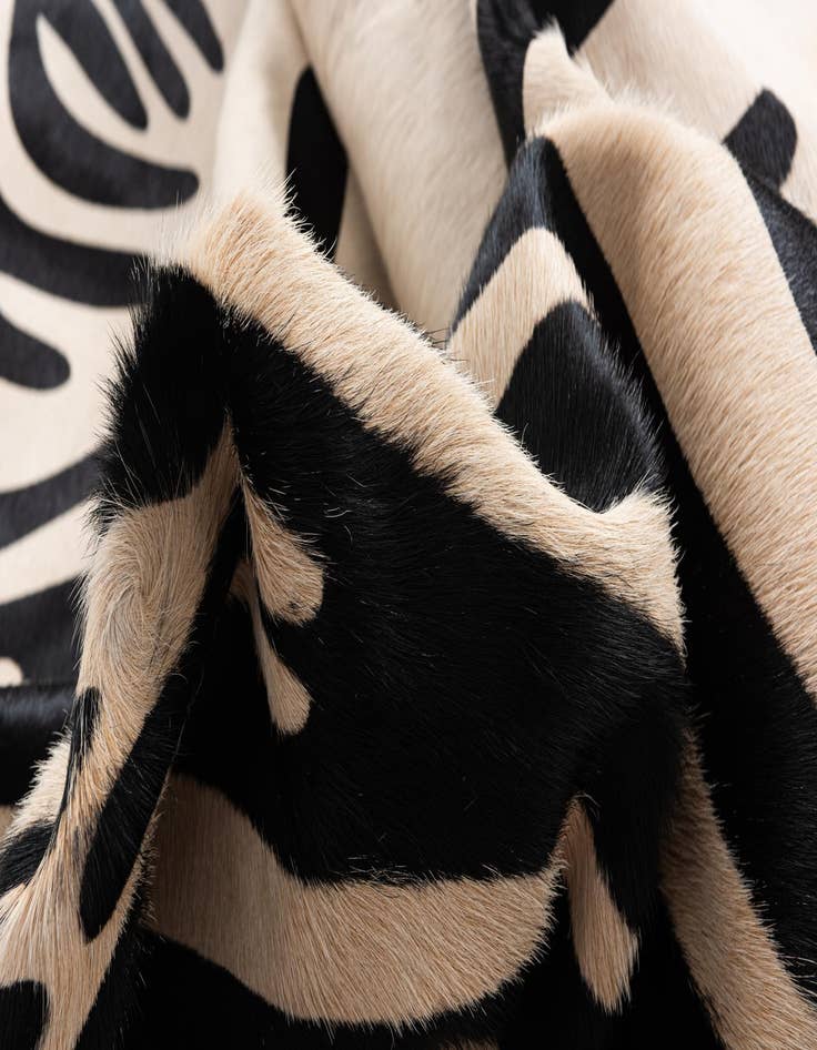 Detail image of  5' 8 x 6' 9 Cowhide Freeform Rug