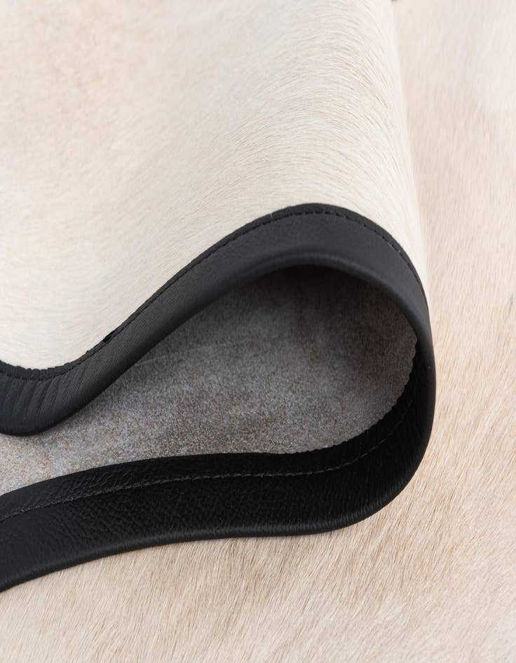 Detail image of  5' 8 x 6' 9 Cowhide Freeform Rug