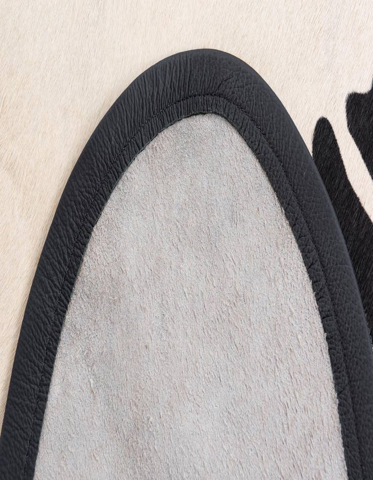 Detail image of  5' 8 x 6' 9 Cowhide Freeform Rug