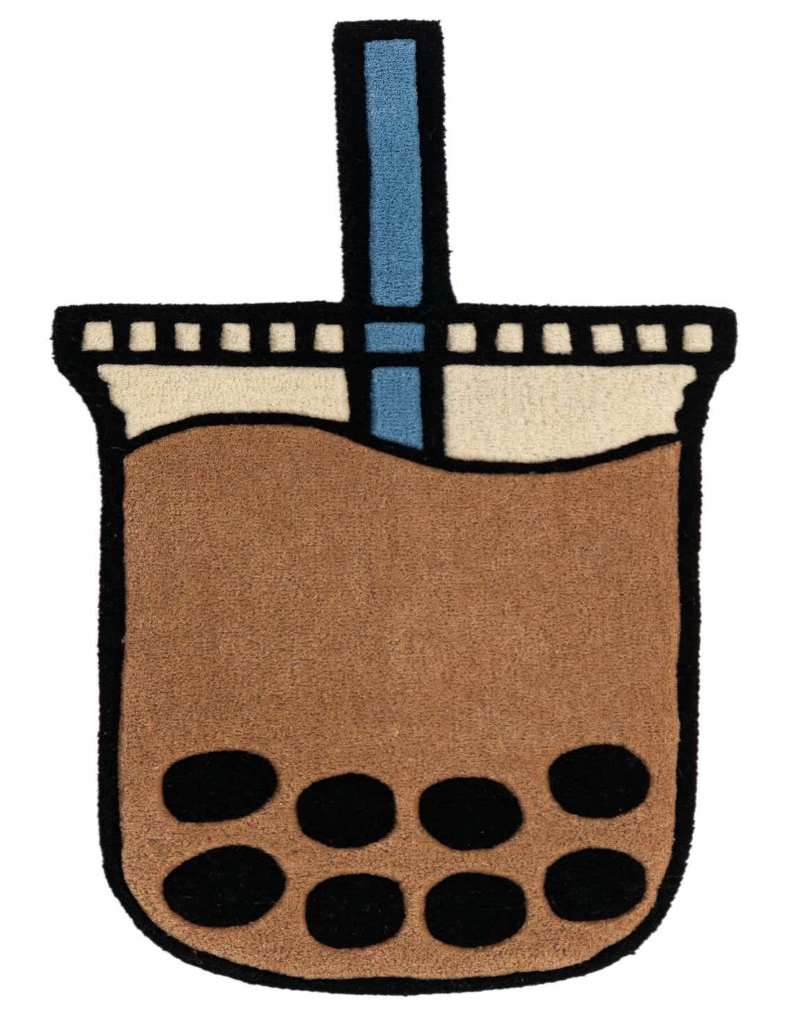 A freeform brown, ivory, and blue rug shaped like a boba tea drink with black tapioca pearls, a blue straw, and a black outline.