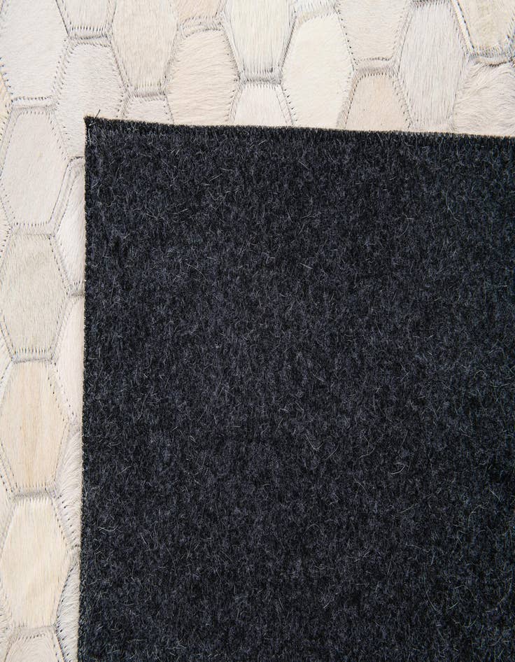Detail image of  5' x 7' 8 Cowhide Stocks Rug