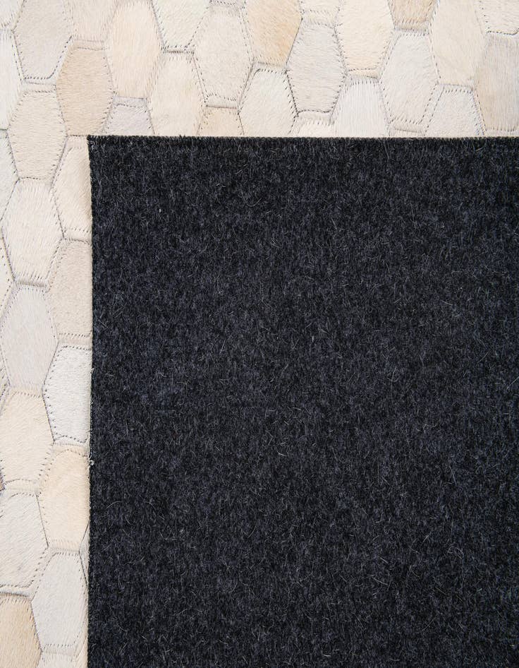 Detail image of  5' x 7' 10 Cowhide Stocks Rug