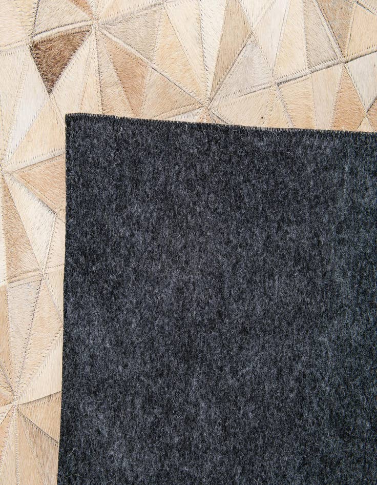 Detail image of  5' 9 x 7' 8 Cowhide Stocks Rug
