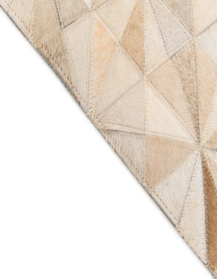 Detail image of  3' 11 x 6' Cowhide Stocks Rug