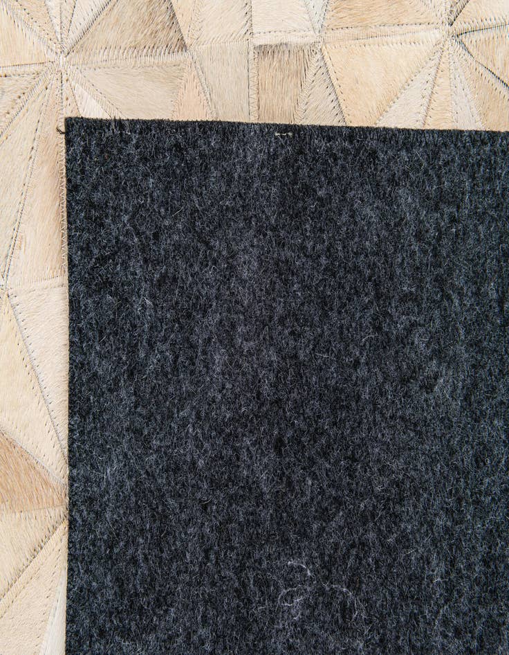 Detail image of  3' 11 x 6' 2 Cowhide Stocks Rug