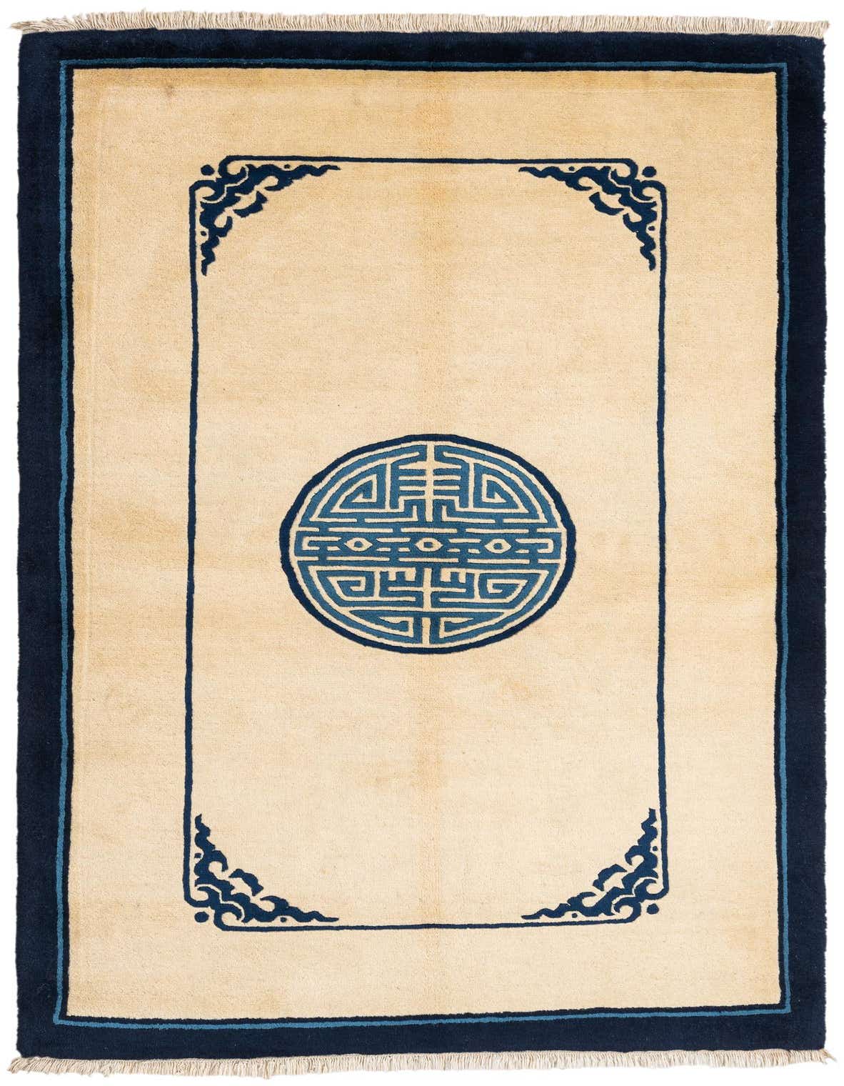 A 3x5 rectangular modern rug with a cream field, navy border, and central medallion, handmade from wool and silk.