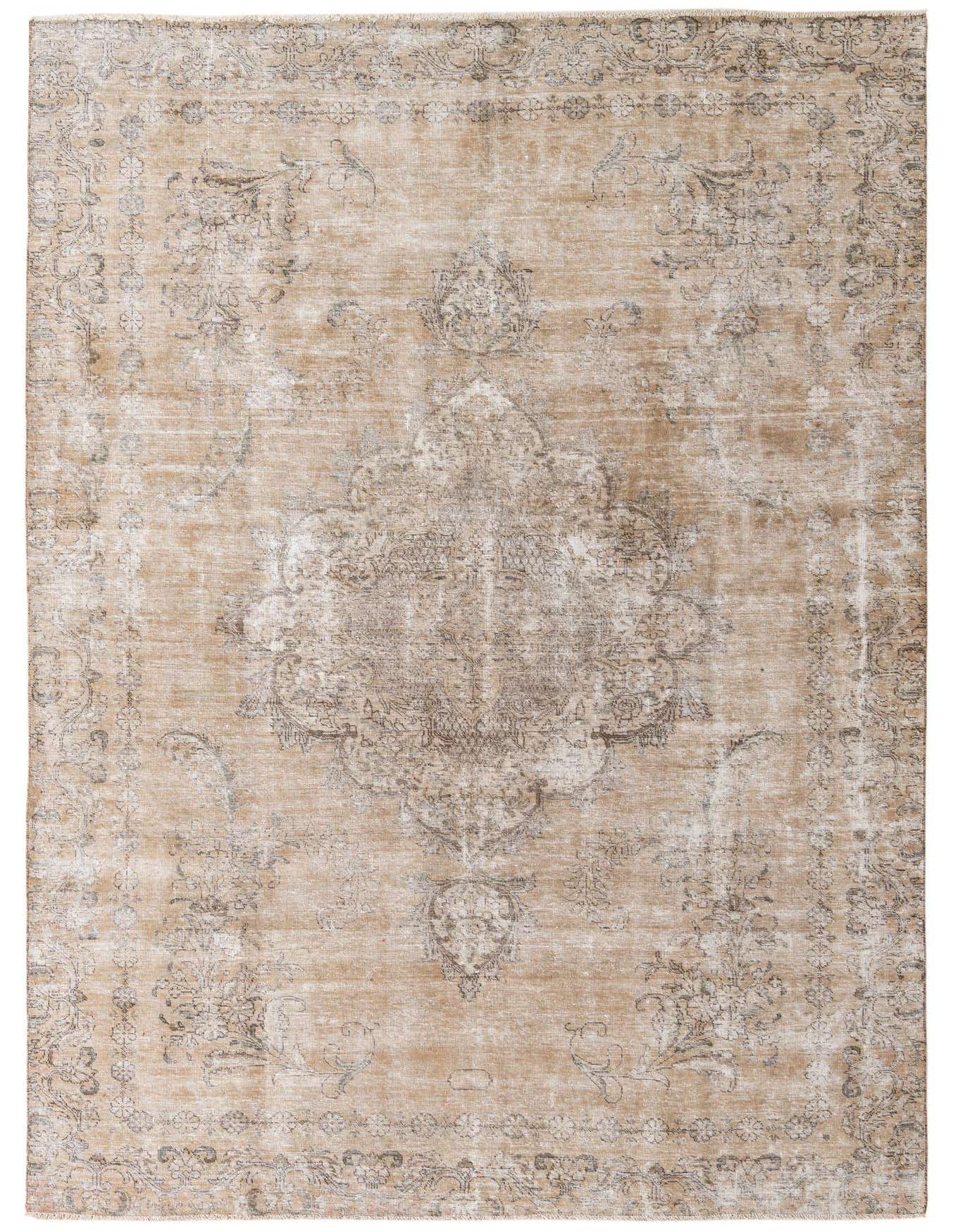 An 8x11 rectangular Ultra Vintage rug with a faded Persian pattern in browns, tans, and ivories, suitable for a living room.