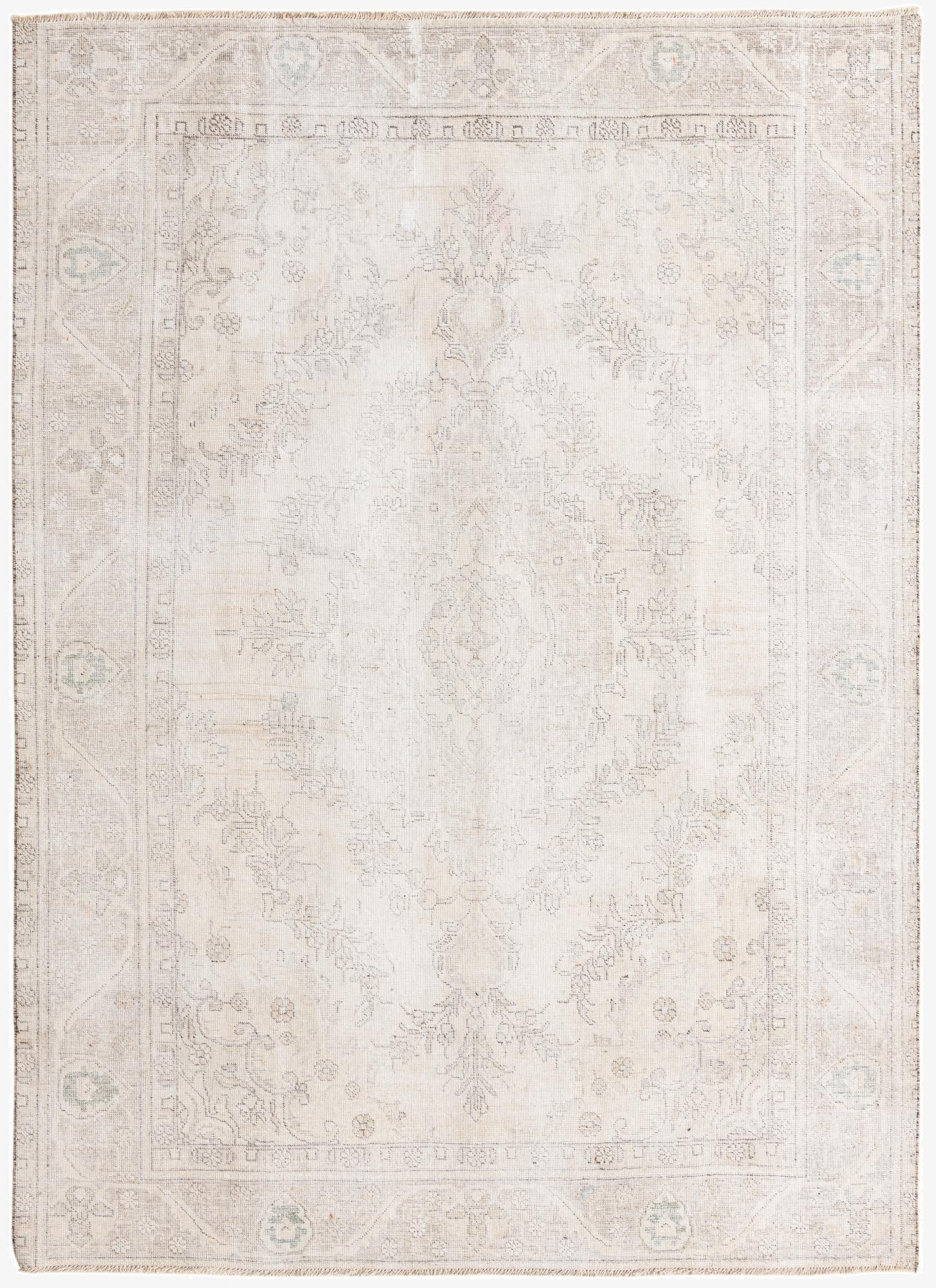 A 6x9 rectangular Ultra Vintage rug in browns and ivories, featuring a faded Persian medallion pattern, ideal for a living room.