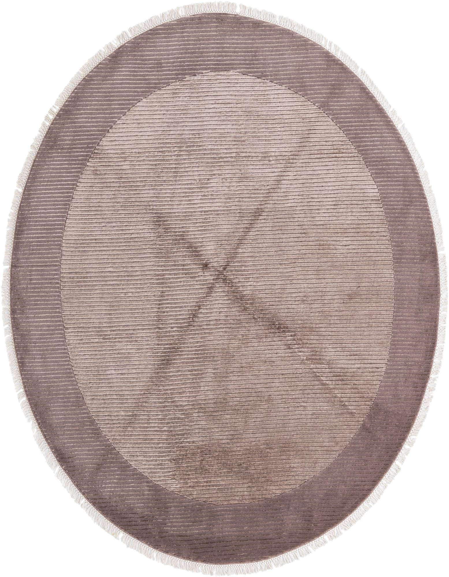 A round, high-pile Darya wool rug in shades of brown and tan, featuring a modern concentric circle design with subtle oriental influences and delicate fringe.