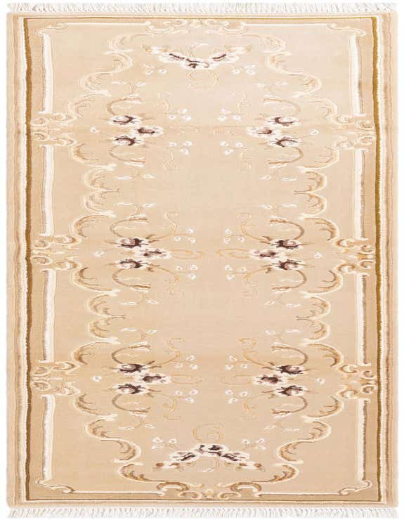 A 10 ft Darya runner rug in brown and ivory wool with a modern oriental floral pattern and fringe.