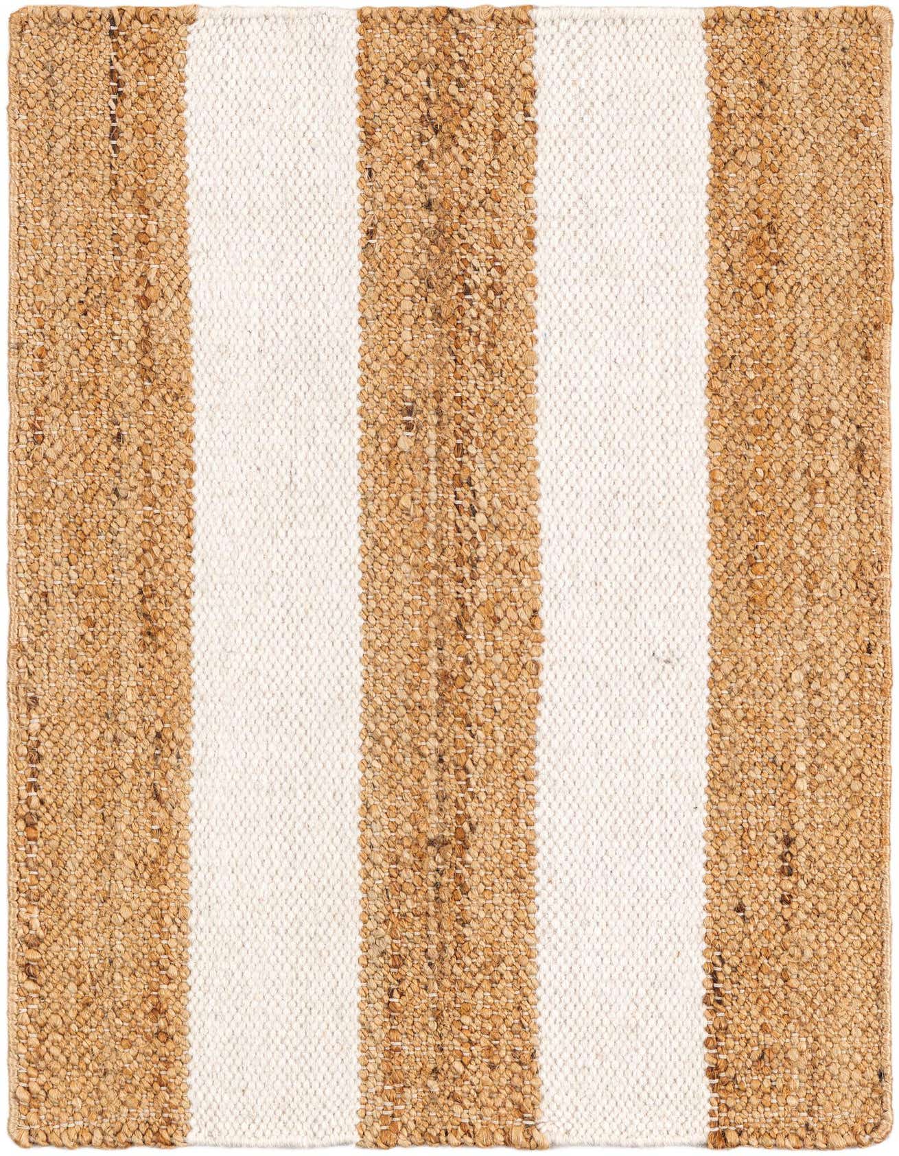 A 2x3 rectangular Jill Zarin Hamptons rug with wide alternating stripes of natural tan jute and creamy ivory wool.