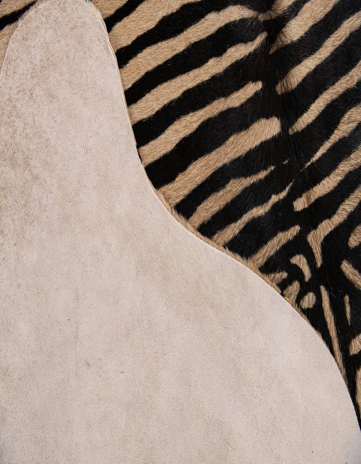 Detail image of  6' 4 x 6' 10 Cowhide Leather Freeform Rug