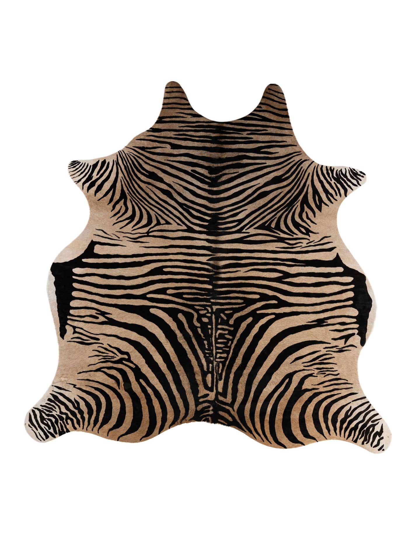 A freeform 6'4 x 6'10 cowhide rug featuring a bold zebra print in shades of brown, tan, and cream.