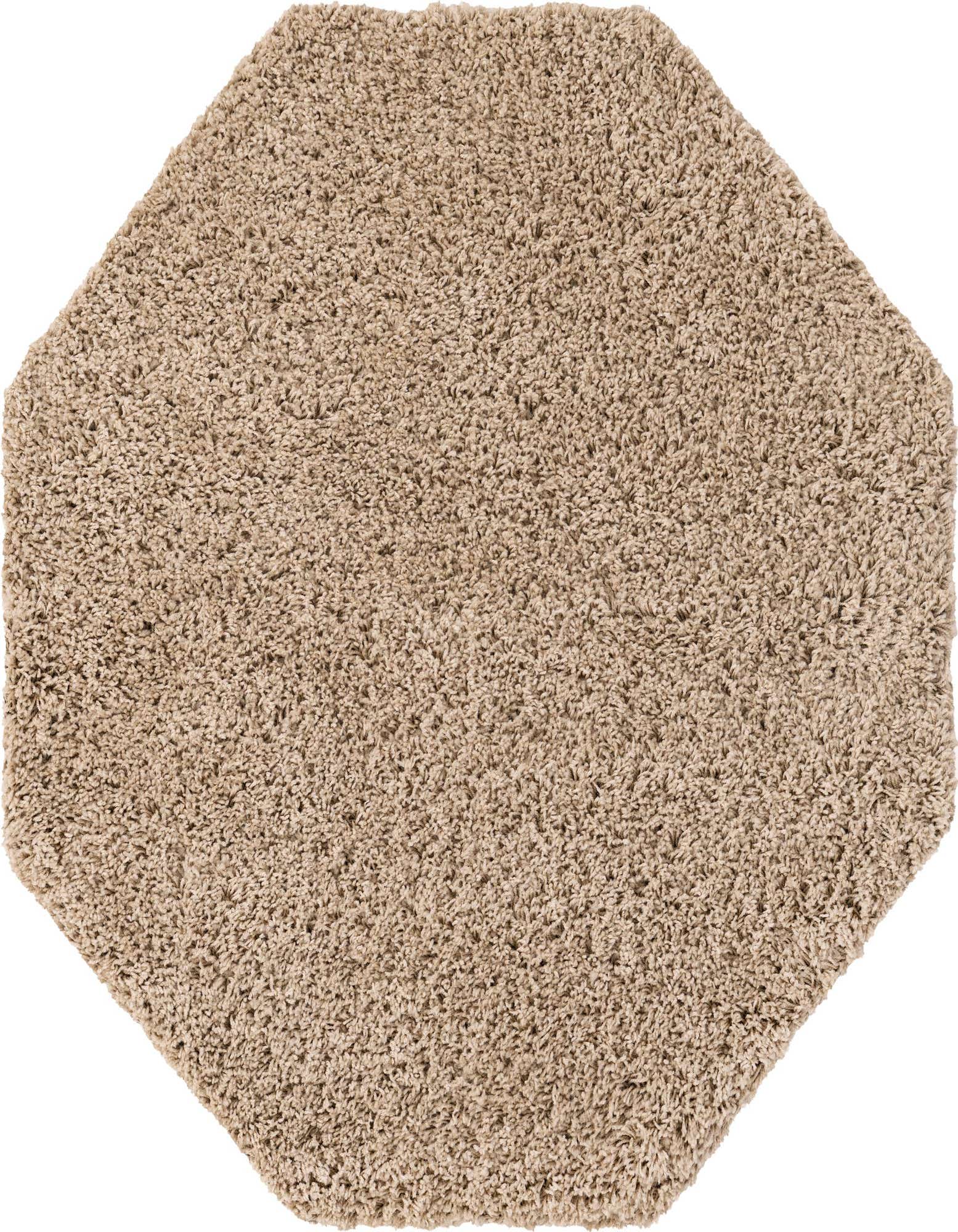 A 4' 0 x 4' 0 octagon-shaped shag rug in a warm tan or light brown color, featuring a soft, textured pile.