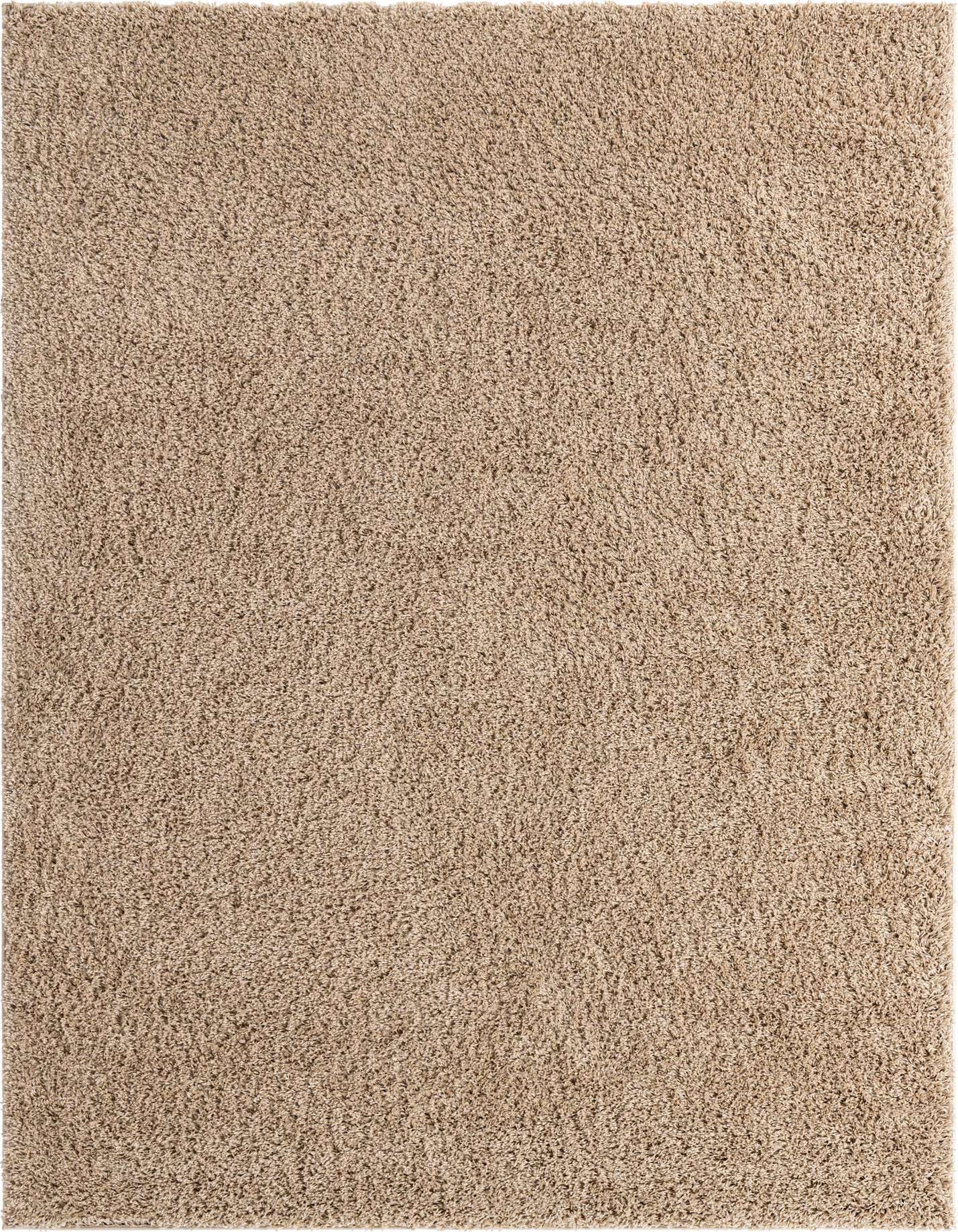 A close-up view of a 10x13 rectangular brown shag rug, showcasing its soft, textured pile.